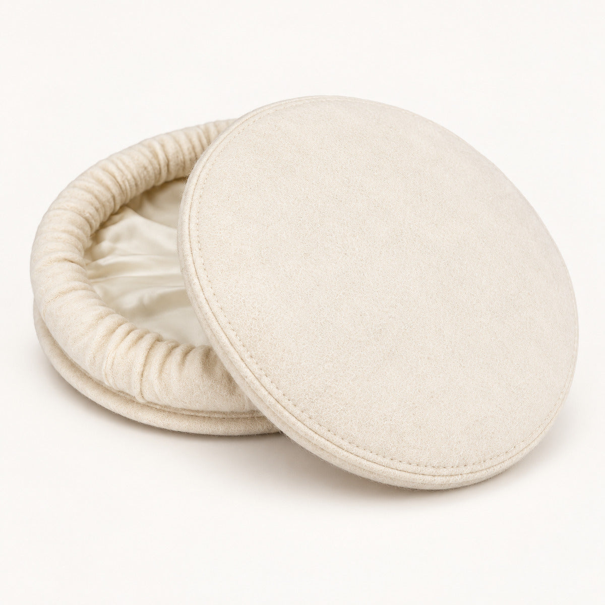 Traditional cream Chitrali Pakol cap for men's winter fashion in Pakistan